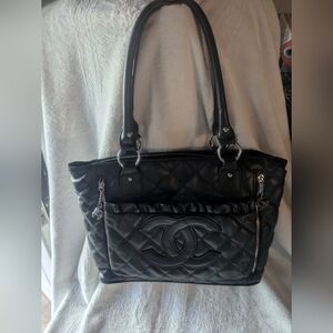 Black Tote with Structured Design and Silver Hardware